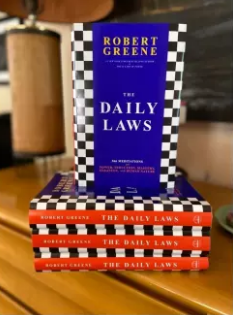The Daily Laws By Robert Greene Excellent Quality White Pages An Author of 48 Laws Of Power and Laws Of Human Nature